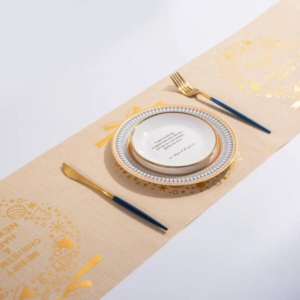 Christmas gold foil linen table runner with snowflake and tree prints in red, gold, and beige