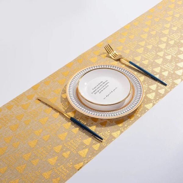 Christmas gold foil linen table runner with snowflake and tree prints in red, gold, and beige
