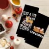 Black cotton tea towel with white dog print pattern