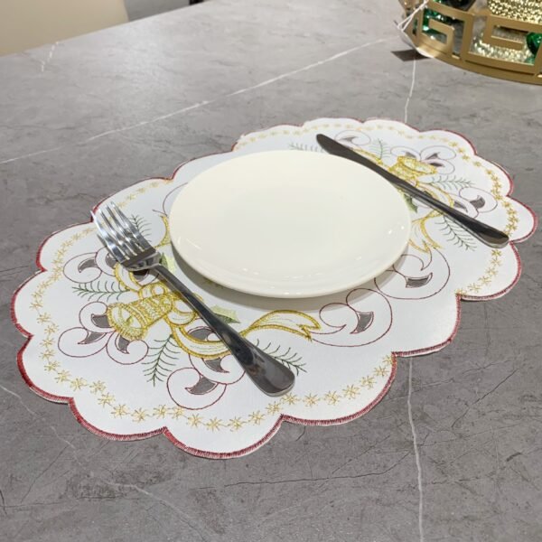 Christmas bell embroidered oval placemat, white cutwork design