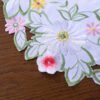 Handmade daisy embroidered round placemat