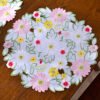 Handmade daisy embroidered round placemat