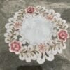 Pink round embroidered placemat for cups and bowls