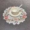 Pink round embroidered placemat for cups and bowls