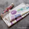 Purple cotton napkin with printed wine glass design