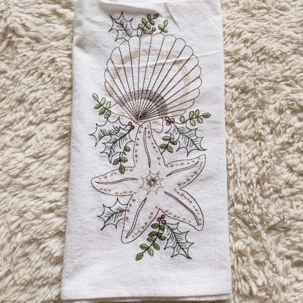 Thick custom cotton tea towel with embroidered logo on wooden table (8) Thick custom cotton tea towel with embroidered logo on wooden table