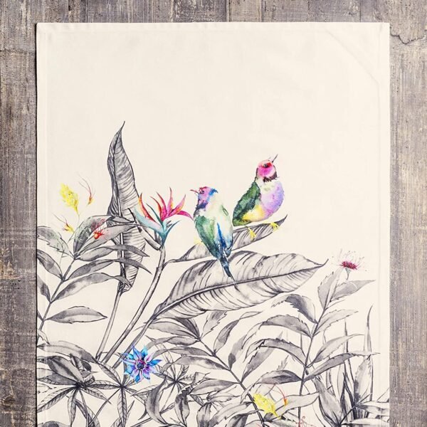Vibrant printed cotton napkin folded on table with utensils