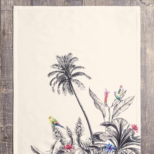 Vibrant printed cotton napkin folded on table with utensils