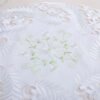 White embroidered round placemat European