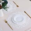White embroidered round placemat European