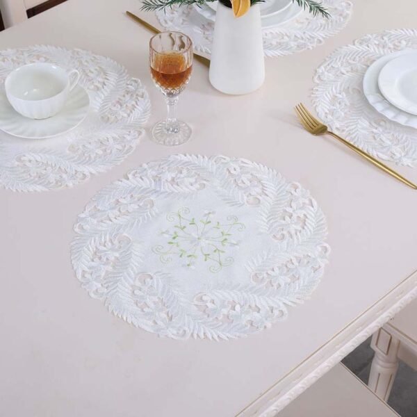 White embroidered round placemat European