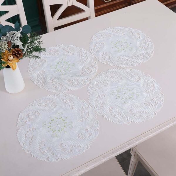 White embroidered round placemat European