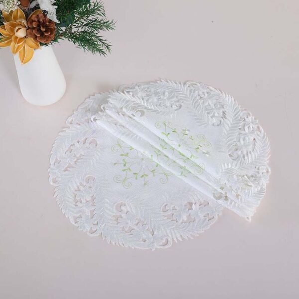 White embroidered round placemat European
