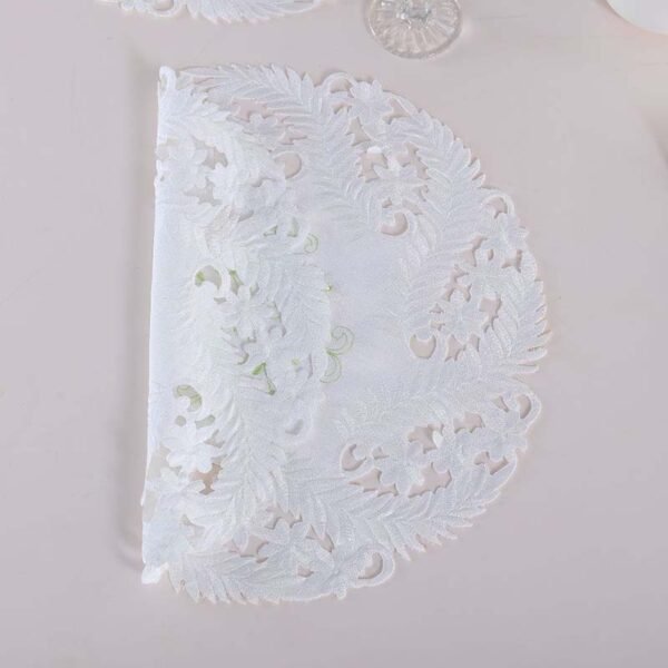 White embroidered round placemat European