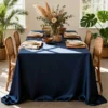 Elegant dining setup with greenery.