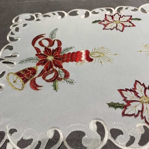 Candle and bell embroidered placemat