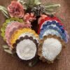 crochet starburst placemat (2) Handmade crochet starburst placemat with colorful edges