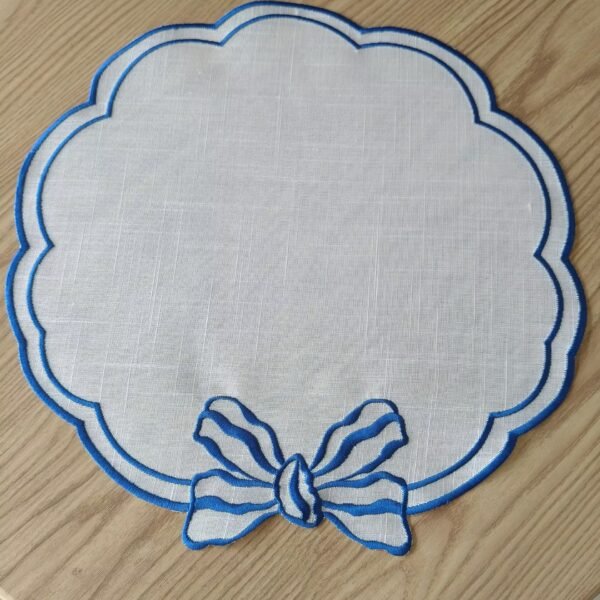 Linen embroidered placemat with floral cutwork
