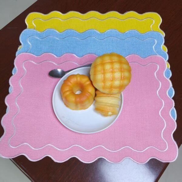 Linen embroidered placemat with floral cutwork