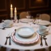Linen embroidered placemat with red stitching