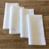 White Linen Hollow Embroidered Napkin | GeoWeave