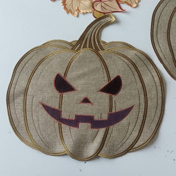 Orange pumpkin embroidered placemat for Thanksgiving