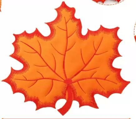 Orange pumpkin embroidered placemat for Thanksgiving