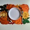 Orange pumpkin embroidered placemat for Thanksgiving