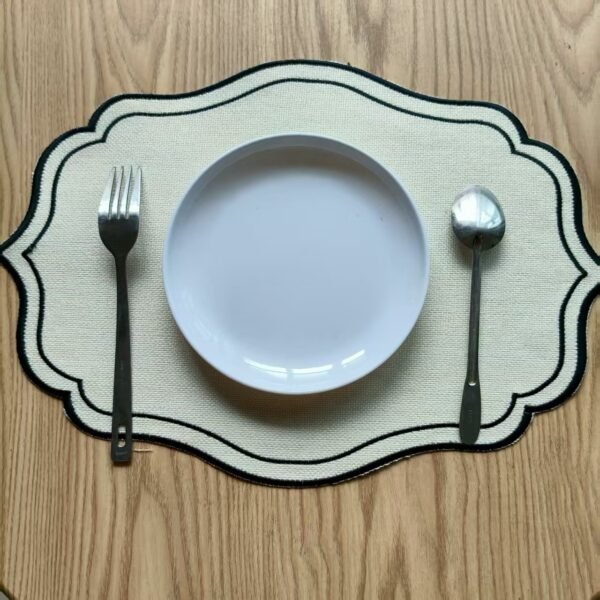 oval linen embroidered placemat (3) Oval beige linen embroidered placemat with cutwork