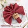 washed cotton napkin (10) Red washed cotton napkin neatly folded on restaurant table setting