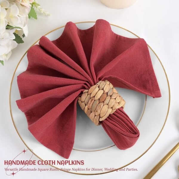 washed cotton napkin (10) Red washed cotton napkin neatly folded on restaurant table setting