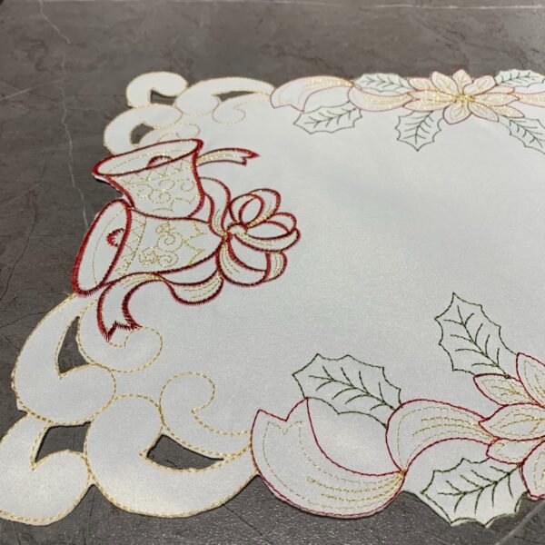 White bell embroidered placemat